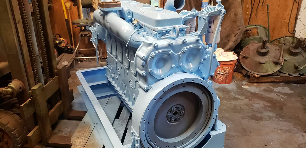 Remanufactured quarry equipment screening plant undergoing whole-machine rebuild at a Miami facility before shipment to the Caribbean and South America